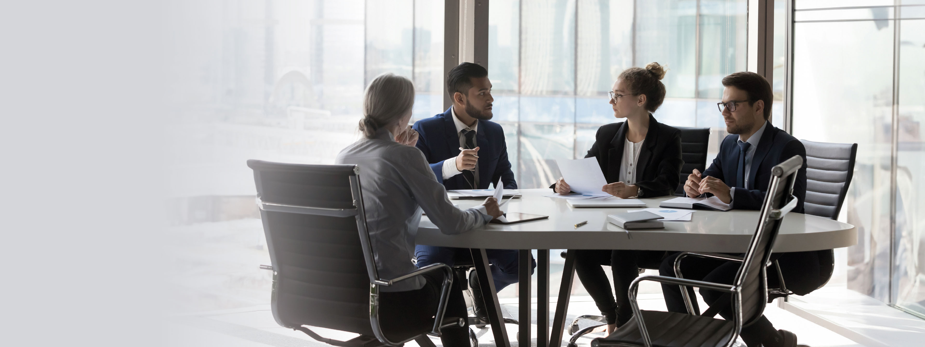 people discussing in a meeting