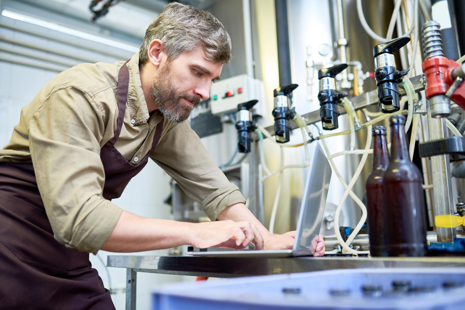 Man viewing Rush Certificate of Good Standing on his laptop