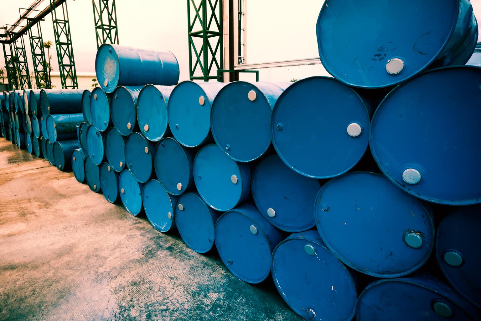 Industry oil barrels or chemical drums stacked up. Fillter image processed.