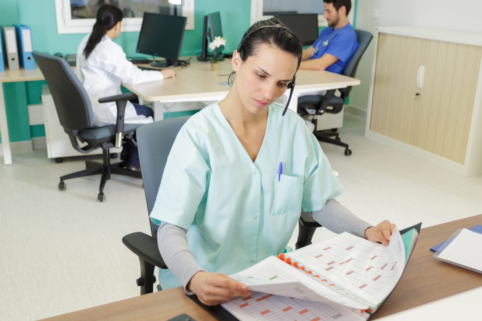 Healthcare worker looking at telemedicine appointments in the personal agenda