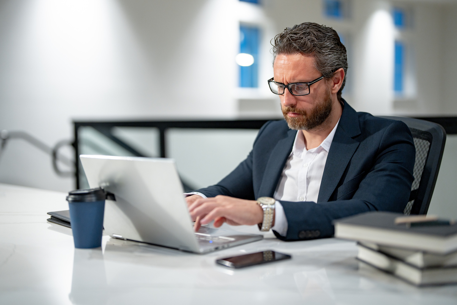 Man working with laptop in office